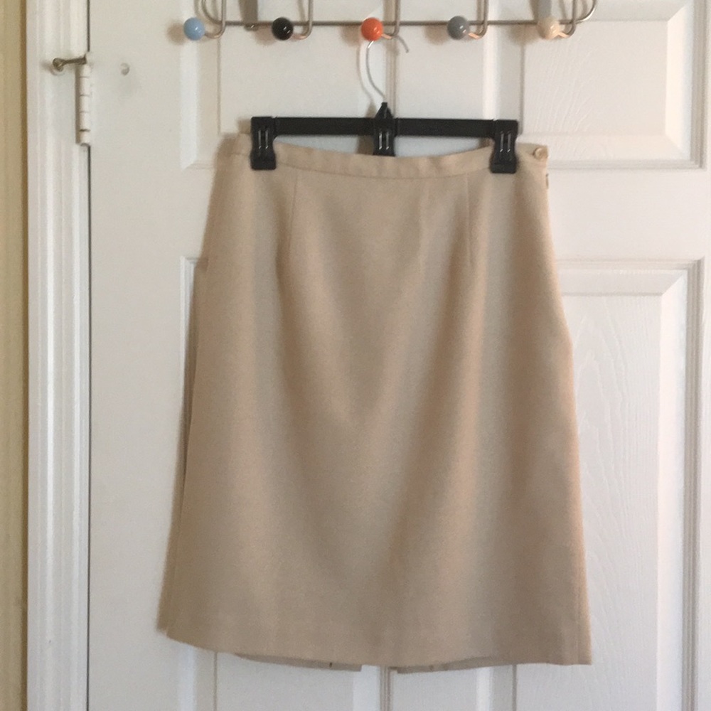 Light tan above the knee lined skirt.